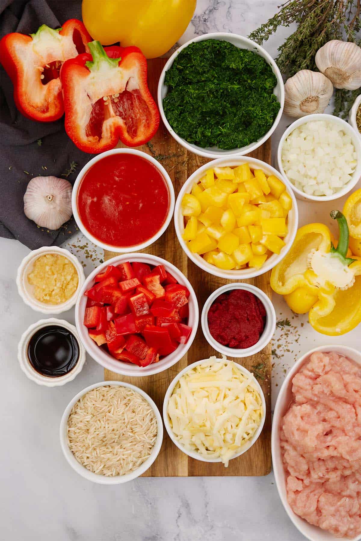 ingredients laid out on a table to make stuffed pepper casserole