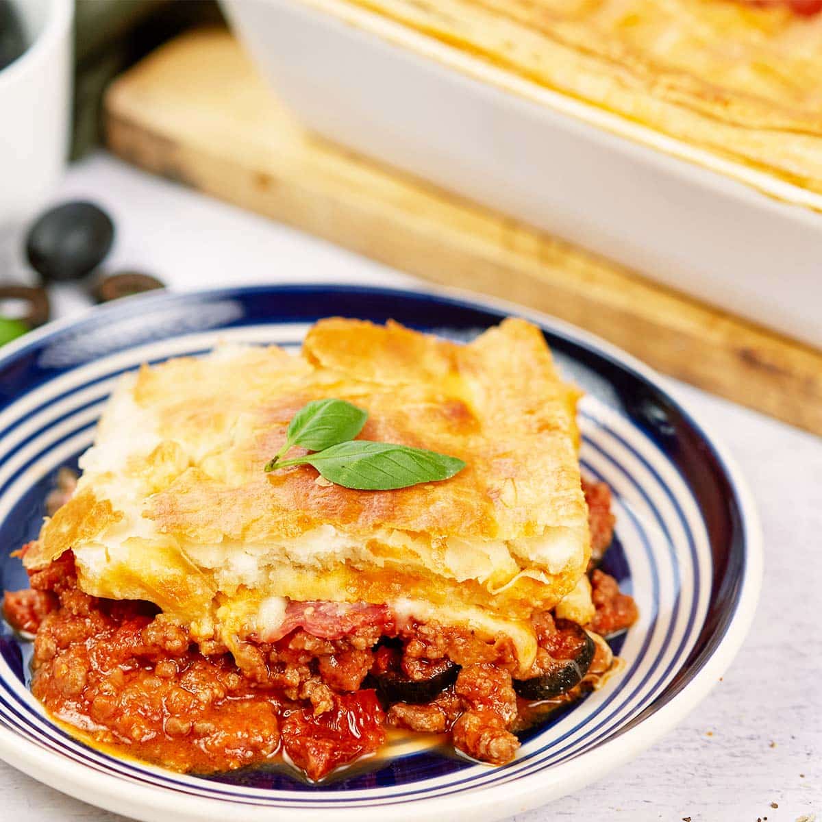 single serving of upside down pizza casserole on a plate ready to enjoy