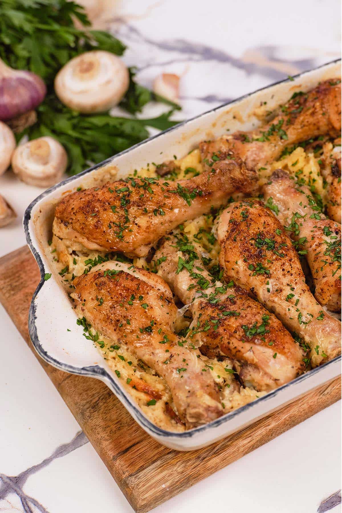 closeup of a Creamy Orzo Chicken Bake in a casserole dish