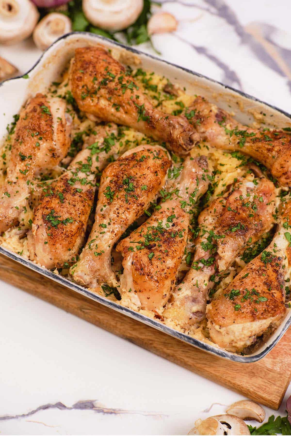 overhead view of a baking dish of Creamy Orzo Chicken Bake ready to serve