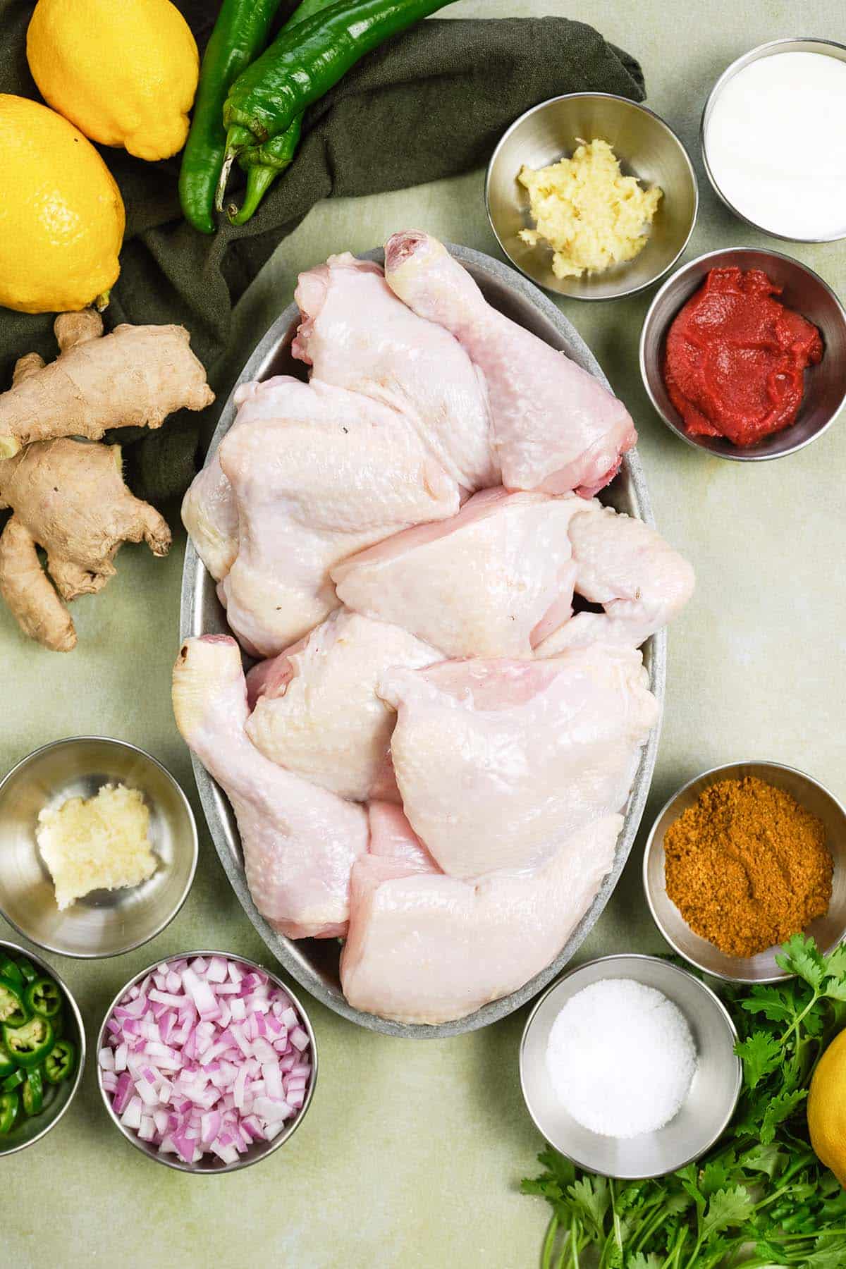 ingredients to make Mum's curried Chicken Bake (tandoori chicken curry) laid out on a table