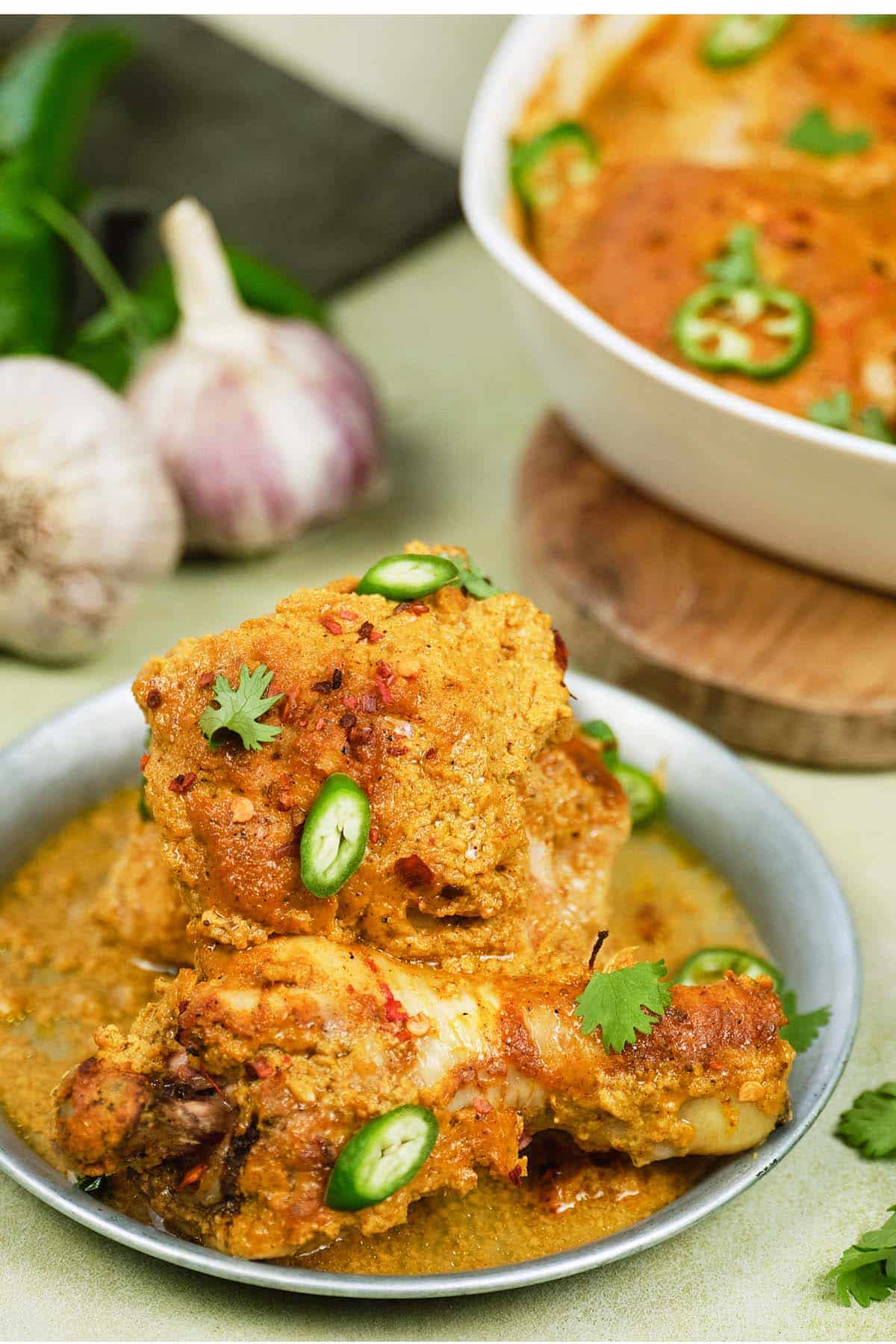 bowl with a serving of Mum's curried Chicken Bake (tandoori chicken curry) ready to enjoy