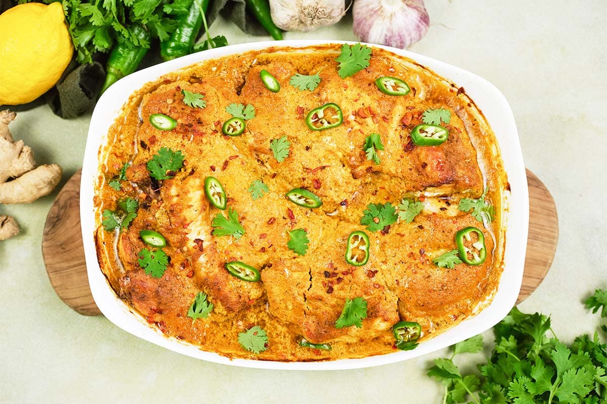 baking dish of Mum's curried Chicken Bake ready to serve and also known as tandoori chicken curry