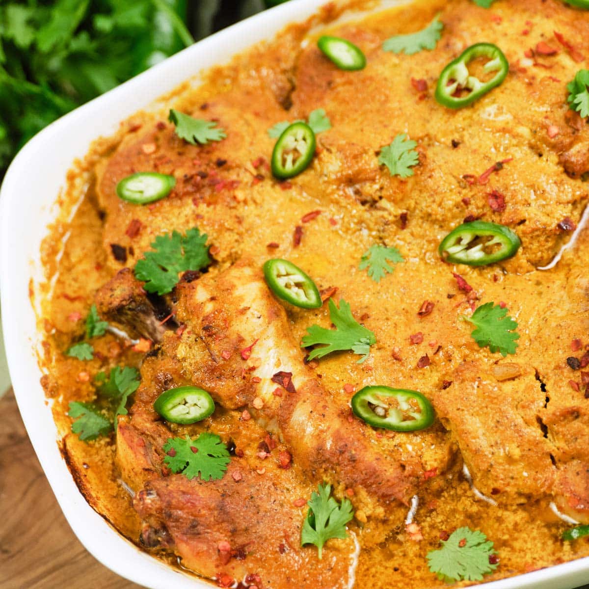 closeup of a casserole dish of Mum's curried Chicken Bake - tandoori chicken curry