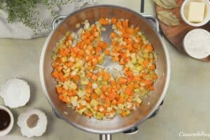 vegetables being sauteed to make beef hot pot casserole