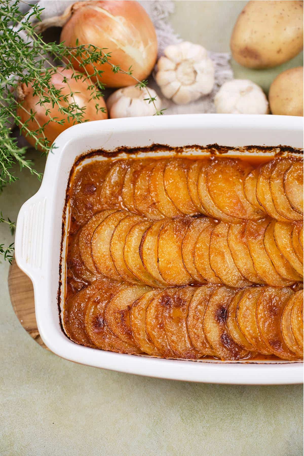 baking dish of beef hot pot casserole on a table ready to serve