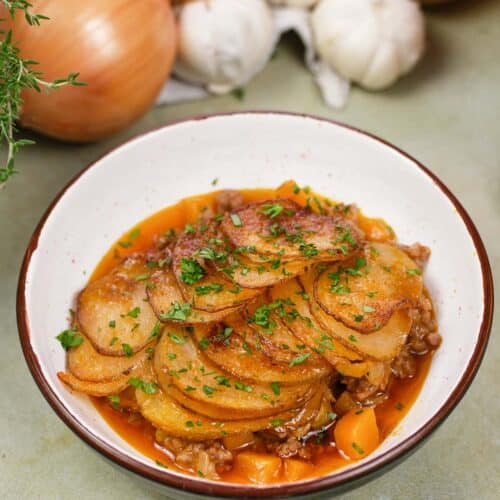 bowl with a serving of beef hot pot casserole ready to enjoy