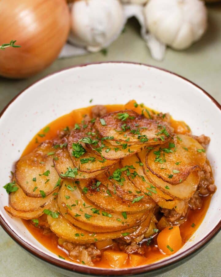 bowl with a serving of beef hot pot casserole ready to enjoy