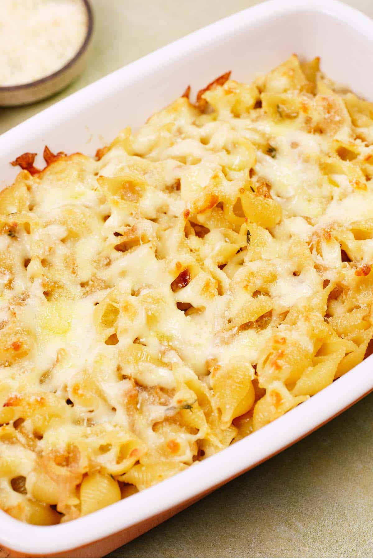 casserole dish of caramelized onion pasta bake fresh from the oven ready to serve