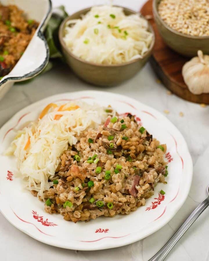 plate with a serving of mushroom barley casserole ready to enjoy