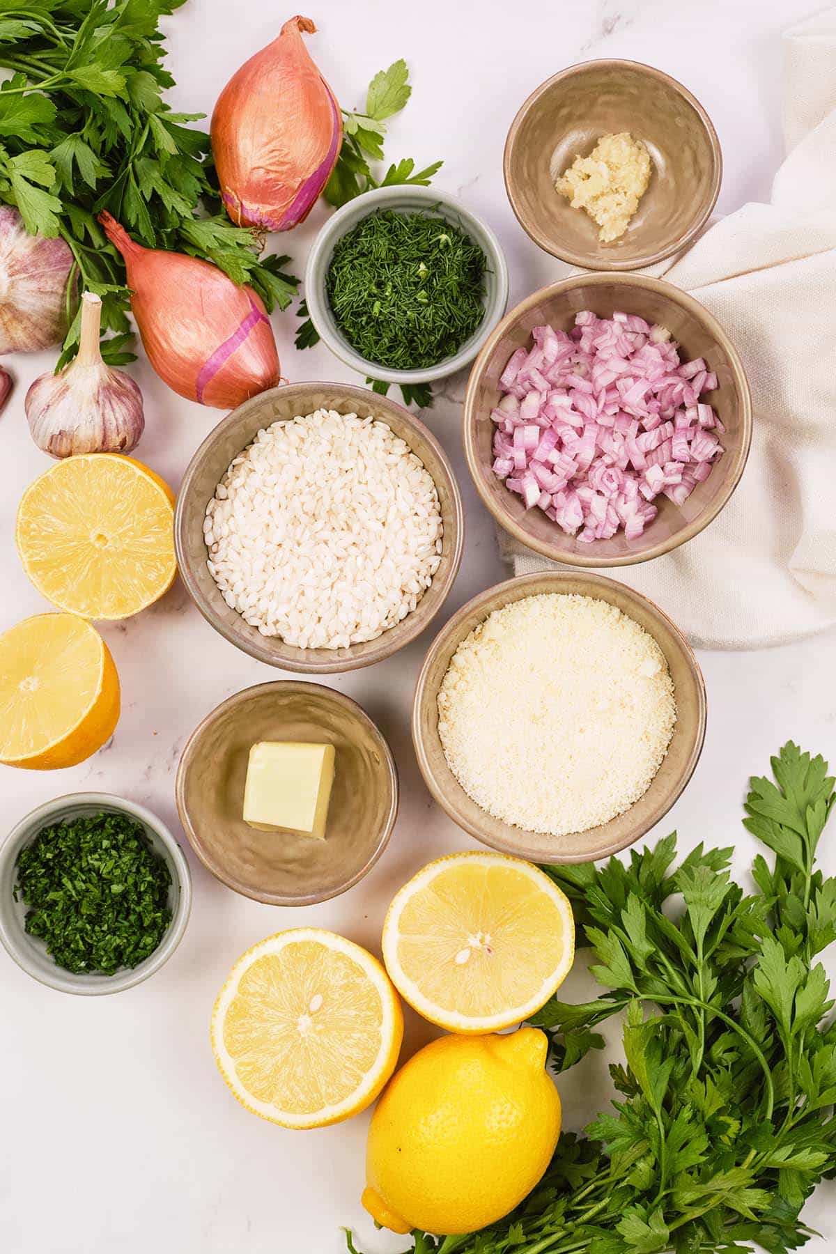 ingredients to make no-stir risotto bake laid out on a table