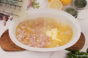 baking dish of the ingredients needed to make no-stir risotto bake