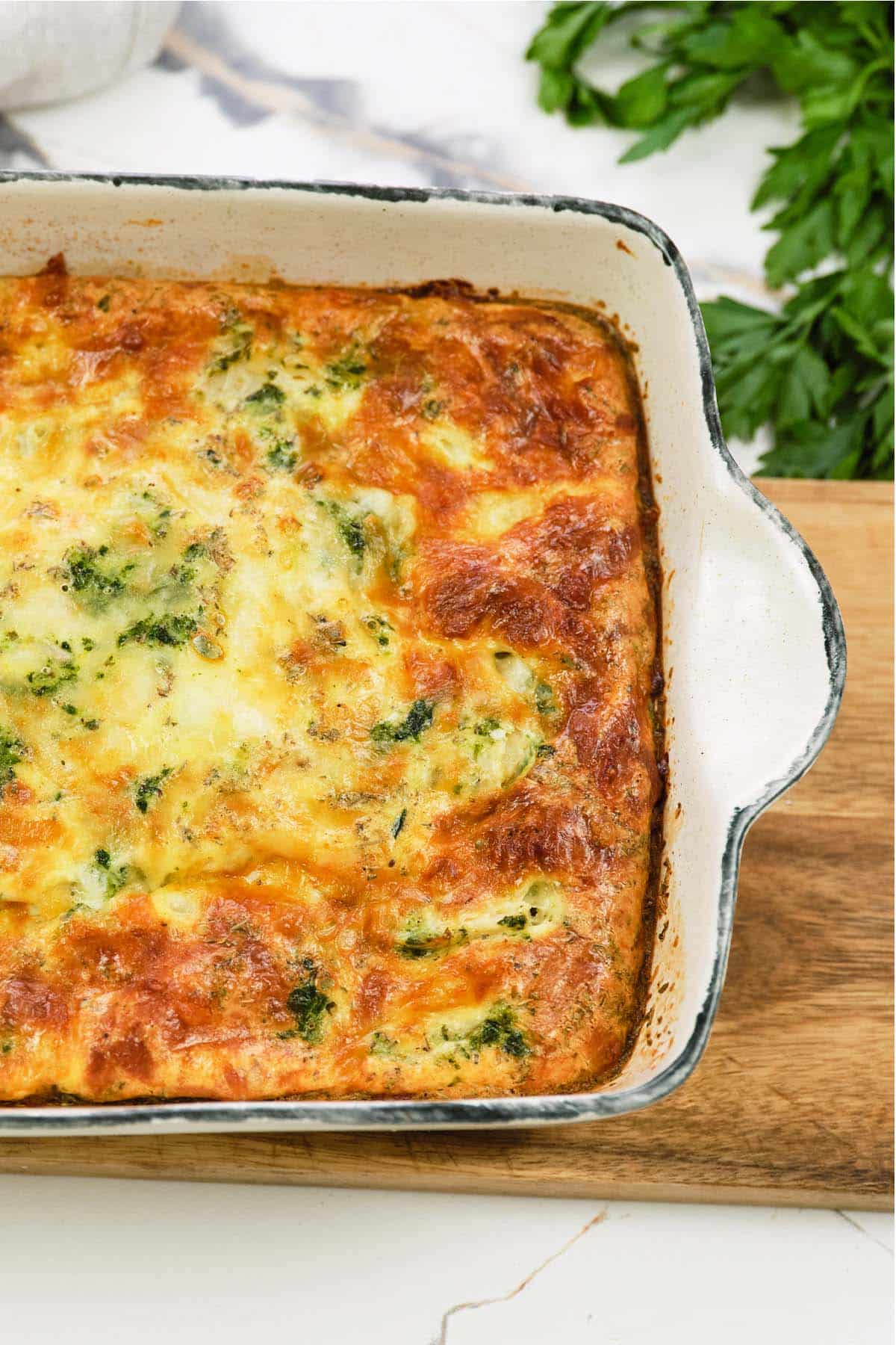 baking dish of spinach artichoke breakfast casserole