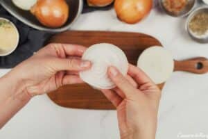 onions being sliced to make Tennessee Onions