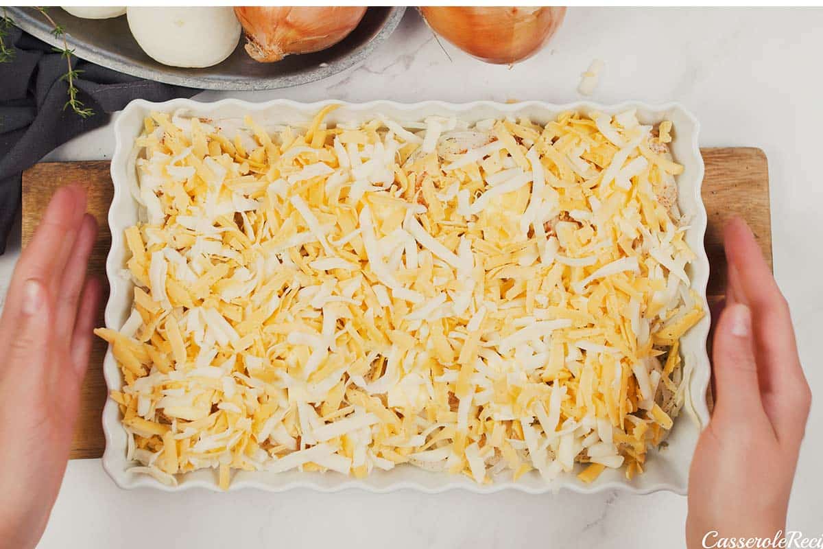 final step of how to make Tennessee Onions by topping with cheese prior to baking