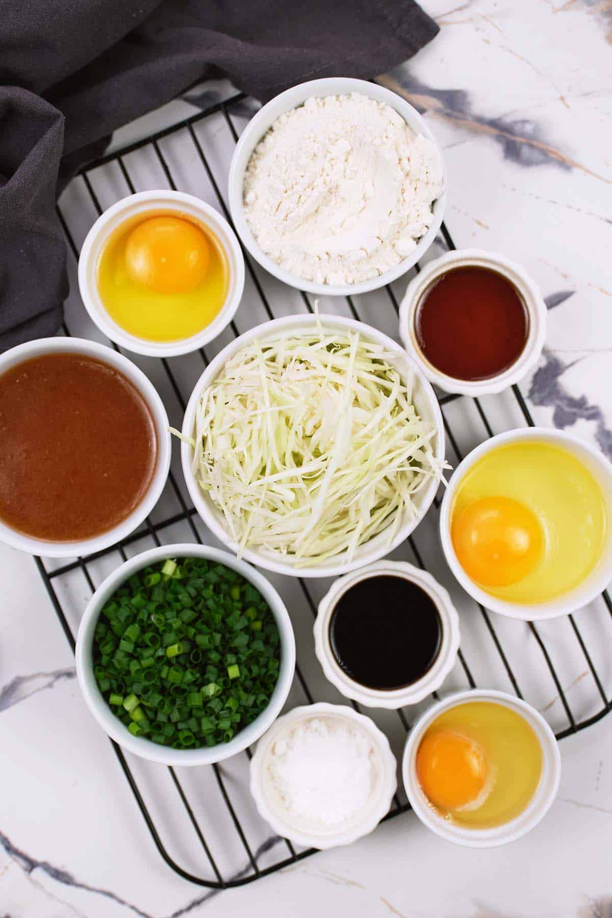 ingredients to make Okonomiyaki bake laid out on a table