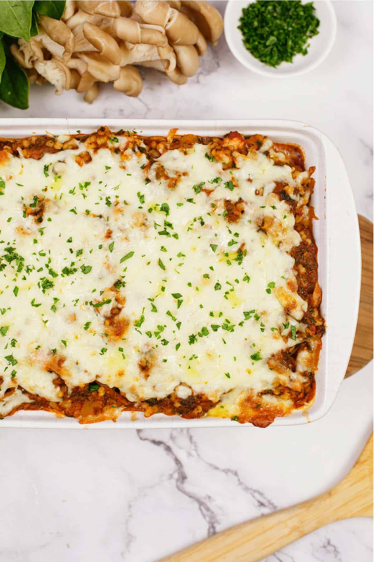 baking dish of Pizza Casserole with Couscous ready to serve