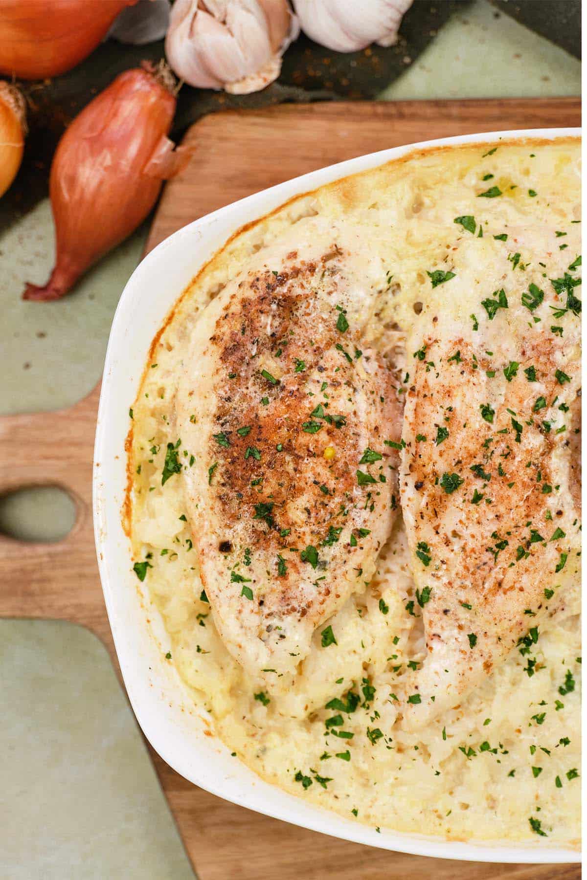 closeup of no-peek chicken casserole in a baking dish