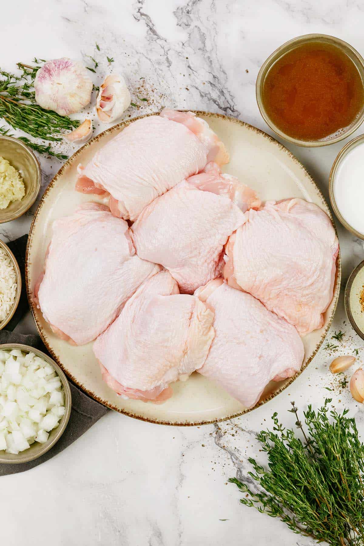 ingredients to make One Pot Caribbean Jerk Chicken & Rice laid out on a table
