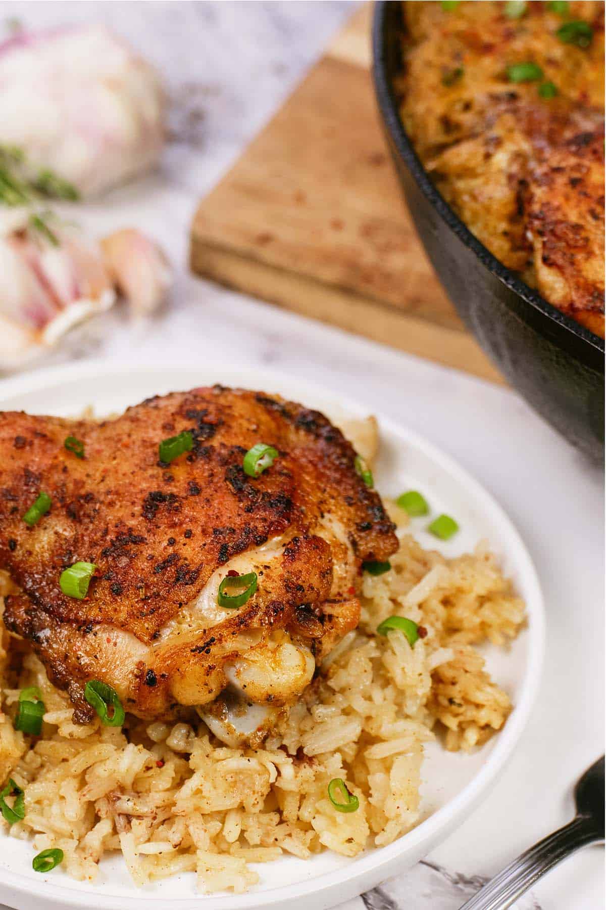 plate with a serving of One Pot Caribbean Jerk Chicken & Rice ready to enjoy