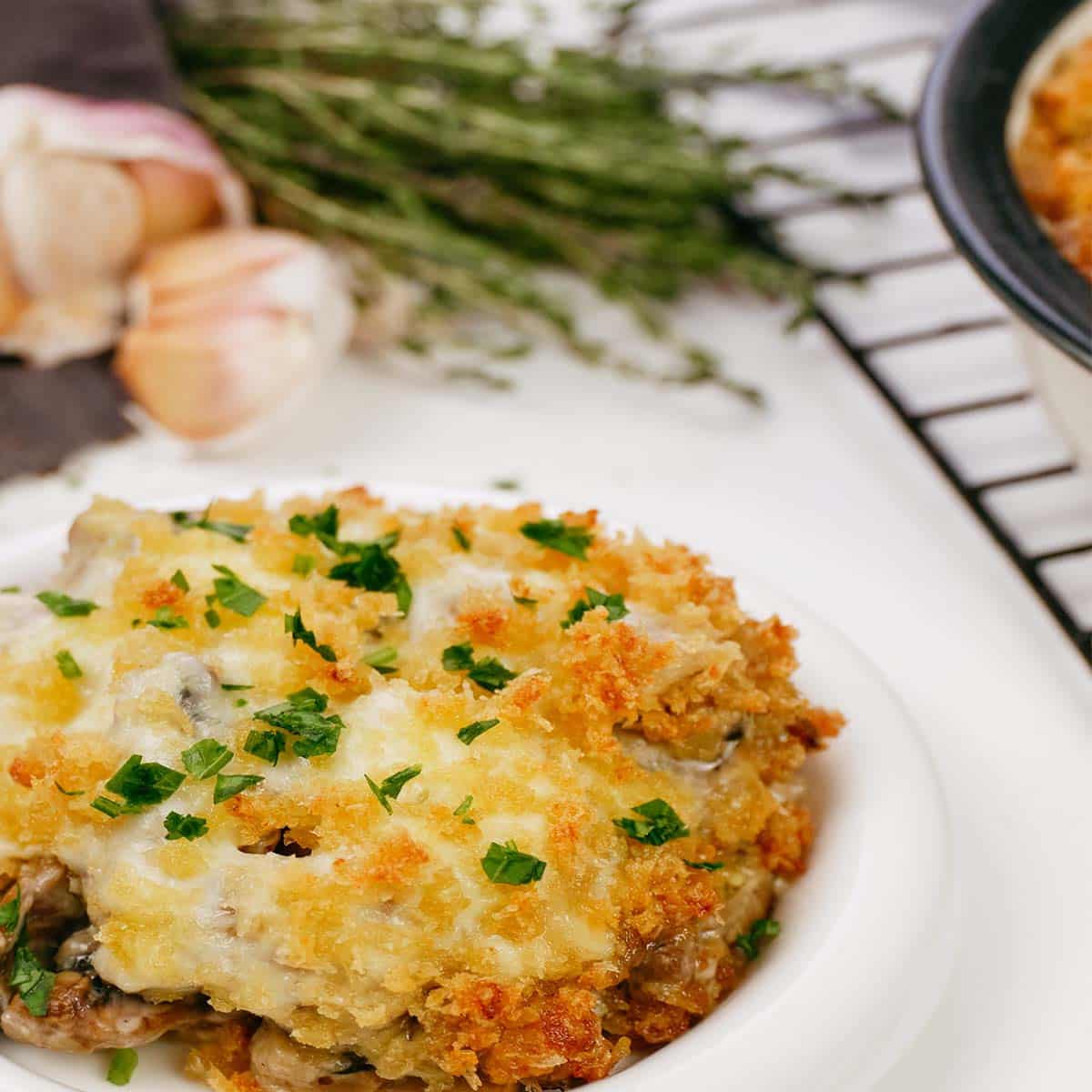 easy stuffed mushroom casserole served on a plate ready to enjoy