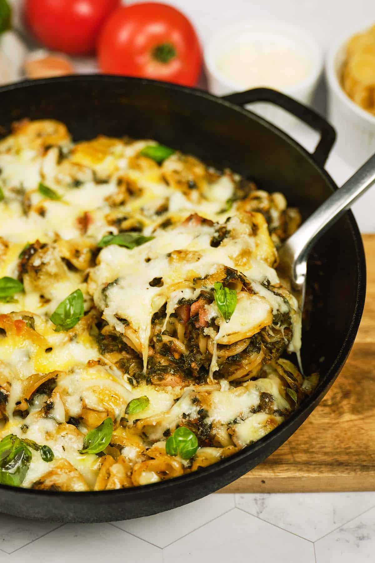 Baked Orecchiette with Spinach being served from a pan fresh from the oven